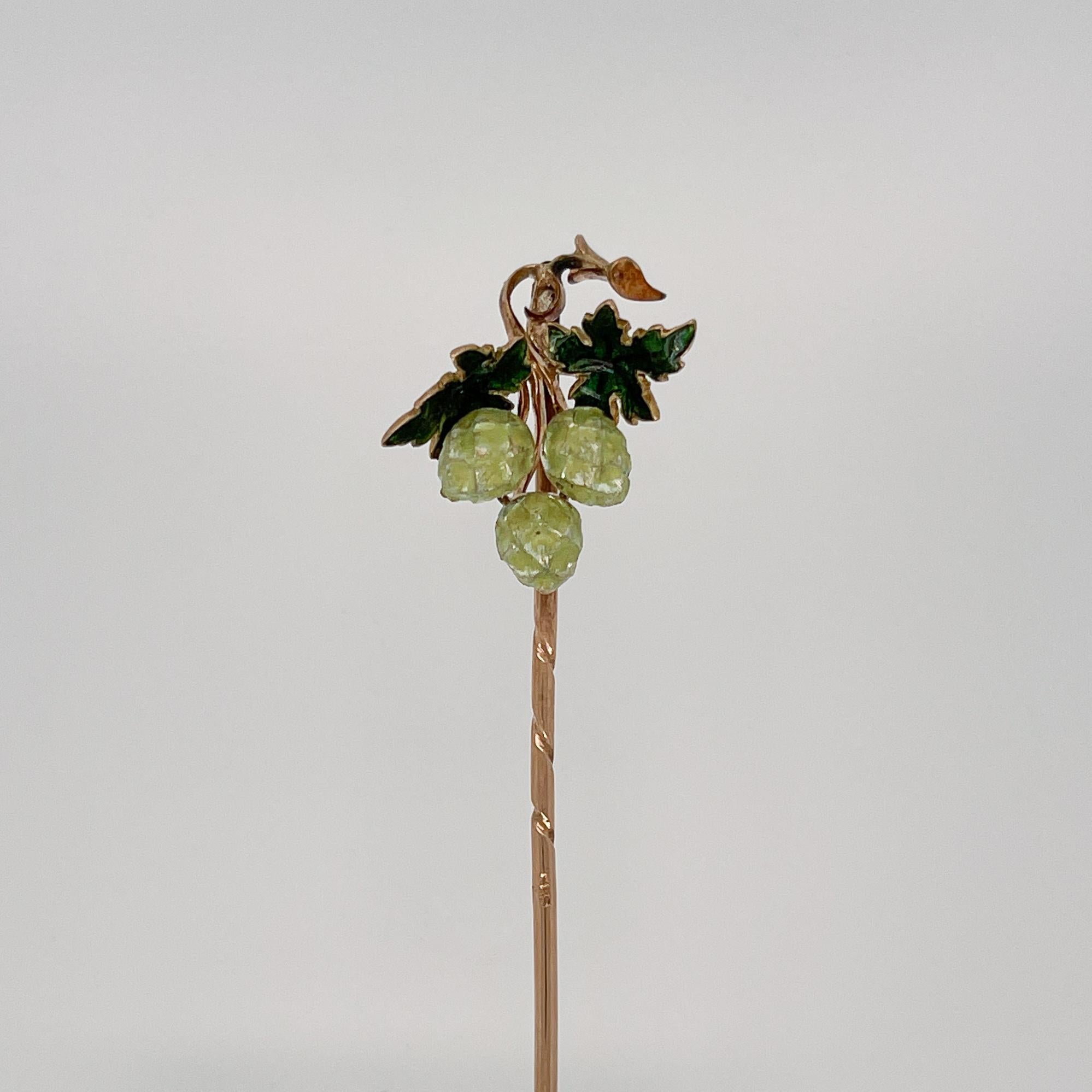 A very fine 14k gold and enameled hop seed (or flower) stickpin.

With enameled 14k gold hop seeds and leaves.

Simply a great stickpin for the beer lover!

Date:
Late 19th Century or Early 20th Century

Overall Condition:
It is in overall good,
