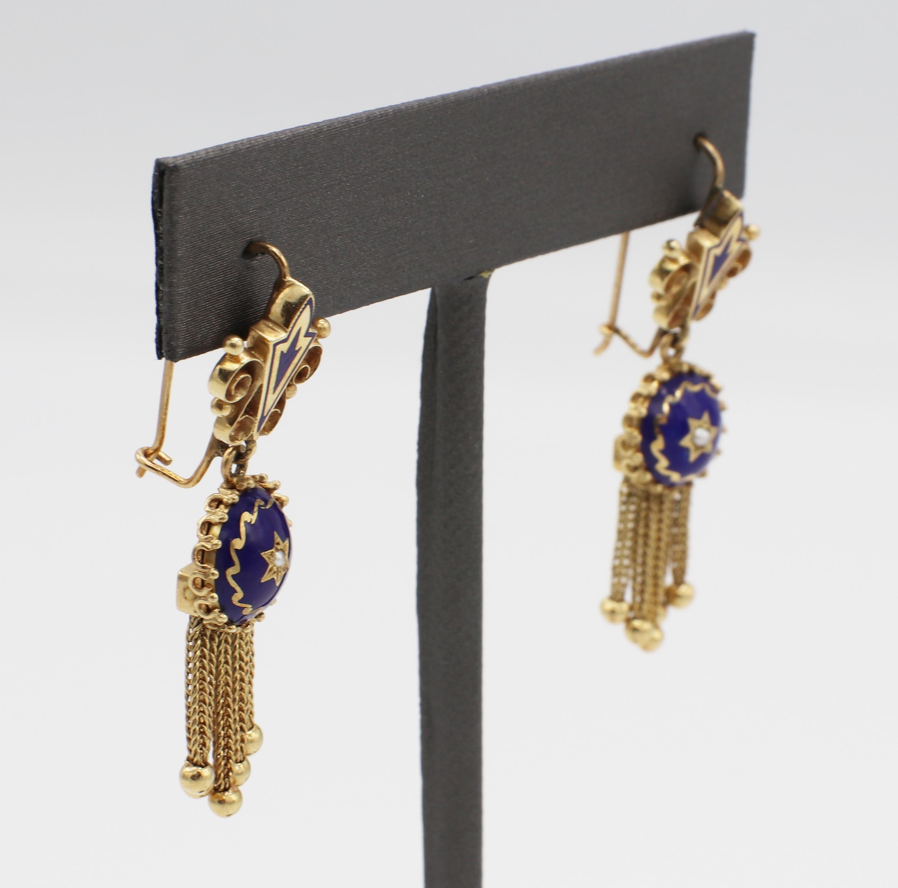 Antique 14 Karat Gold Blue Enamel & Pearl Dangle Fringe Drop Earrings 
Metal: 14k yellow gold
Weight: 7.67 grams
Enamel: Blue
Pearls: Natural seed pearls, 1.4MM
Length: 40MM
Width: 11MM
