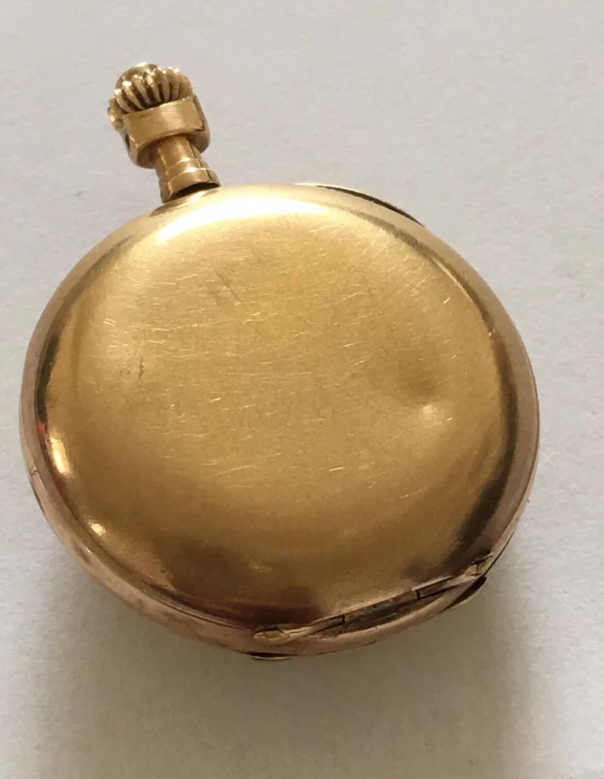 This lovely watch is in good working condition. Visible signs of ageing and wear with a bit of stain on the 9 o’clock enamel dial. The loop or metal ring is missing. There is a visible dent on the back case cover as shown. Please study the images