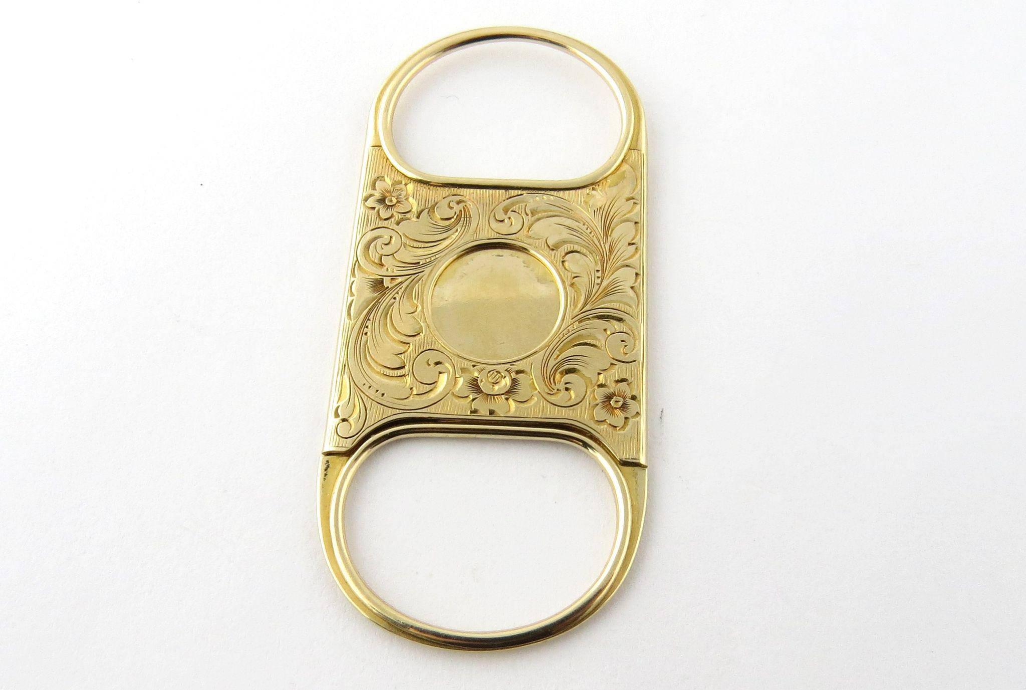 Antique 14K Yellow Gold Hand Engraved Cigar Cutter with Ornate Hand Engraving 

1902 

Hallmarked R.S. Pat. Dec. 9. 02. 14K

 8.0 g 5.15 dwt

Beautiful intricate design

 This cutter will be packaged securely and shipped priority mail with insurance