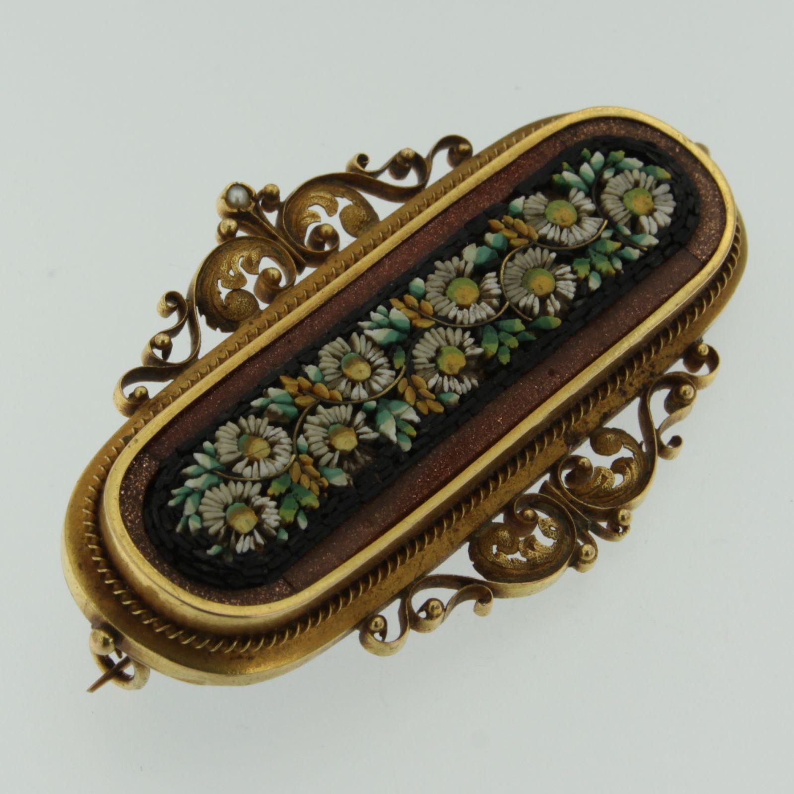 An unique old 19th century micro mosaic brooch mounted in 14k yellow gold. 

Flowers and leaves, on goldstone.

Some flowers has little damages - see pictures, but overall condition is good

