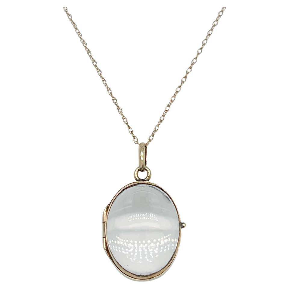 Antique 14 Karat Gold and Oval Rock Crystal Pools of Light Photo Locket ...