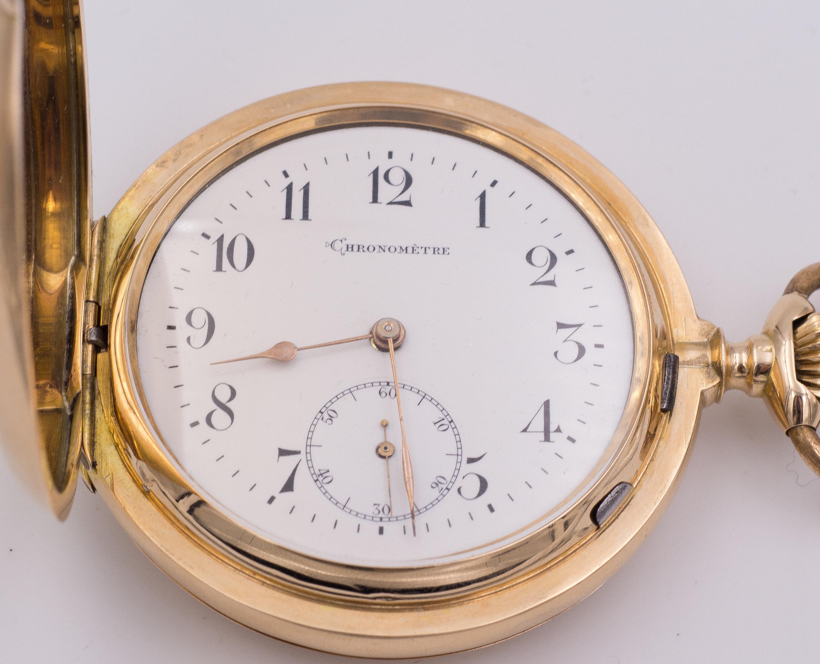 A stunning antique 14K gold savonette Chronomètre pocket watch, dating from the Late 19th Century, set with detent escapement. 

BRAND
Chronomètre

MATERIALS
14K gold

MEASUREMENTS
Diameter: 58 mm
