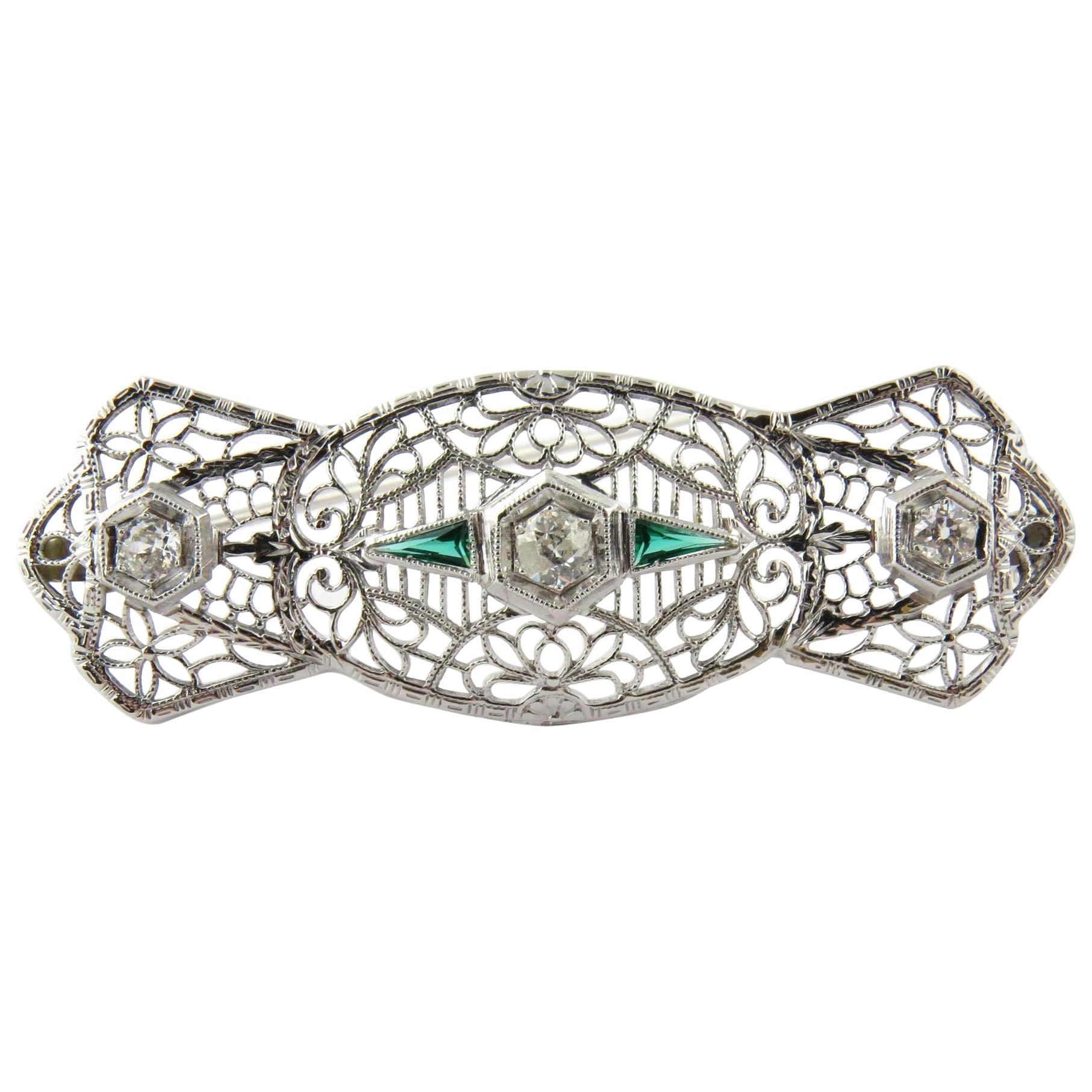 Antique 14 Karat White Gold Art Deco Diamond and Emerald Filigree Brooch Pin For Sale