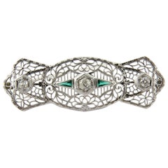 Antique 14 Karat White Gold Art Deco Diamond and Emerald Filigree Brooch Pin
