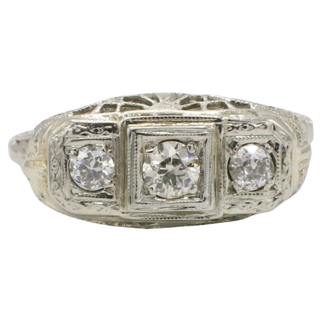 Antique 14 Karat White Gold Three-Stone Natural Diamond Filigree Ring