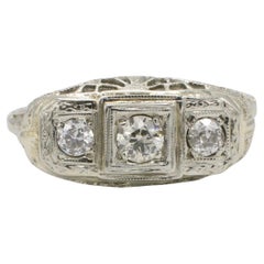 Antique 14 Karat White Gold Three-Stone Natural Diamond Filigree Ring