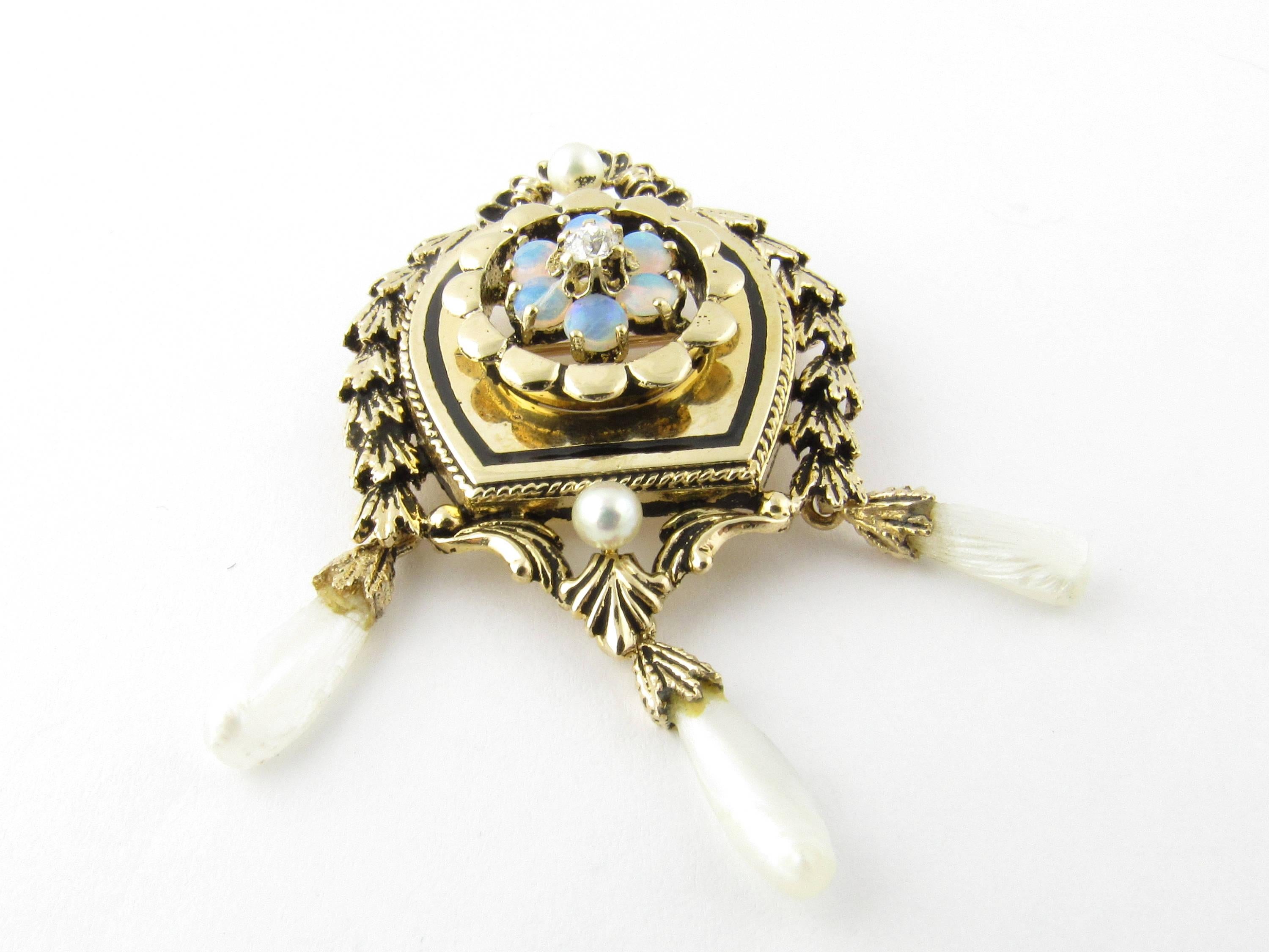 Antique Yellow Gold Opal and Pearl Brooch/Pendant- 
This beautifully crafted piece features exquisitely detailed 14K yellow gold accented with six opals, one old mine cut diamond and two cultured pearls. Three freshwater pearls dangle from bottom of
