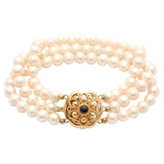 Bracciale con perle coltivate e granato d'epoca in oro 14K