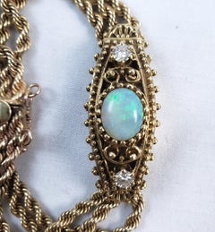 Antique 14 Karat Yellow Gold Peek A Boo Ladies Wristwatch with Opal and Diamonds