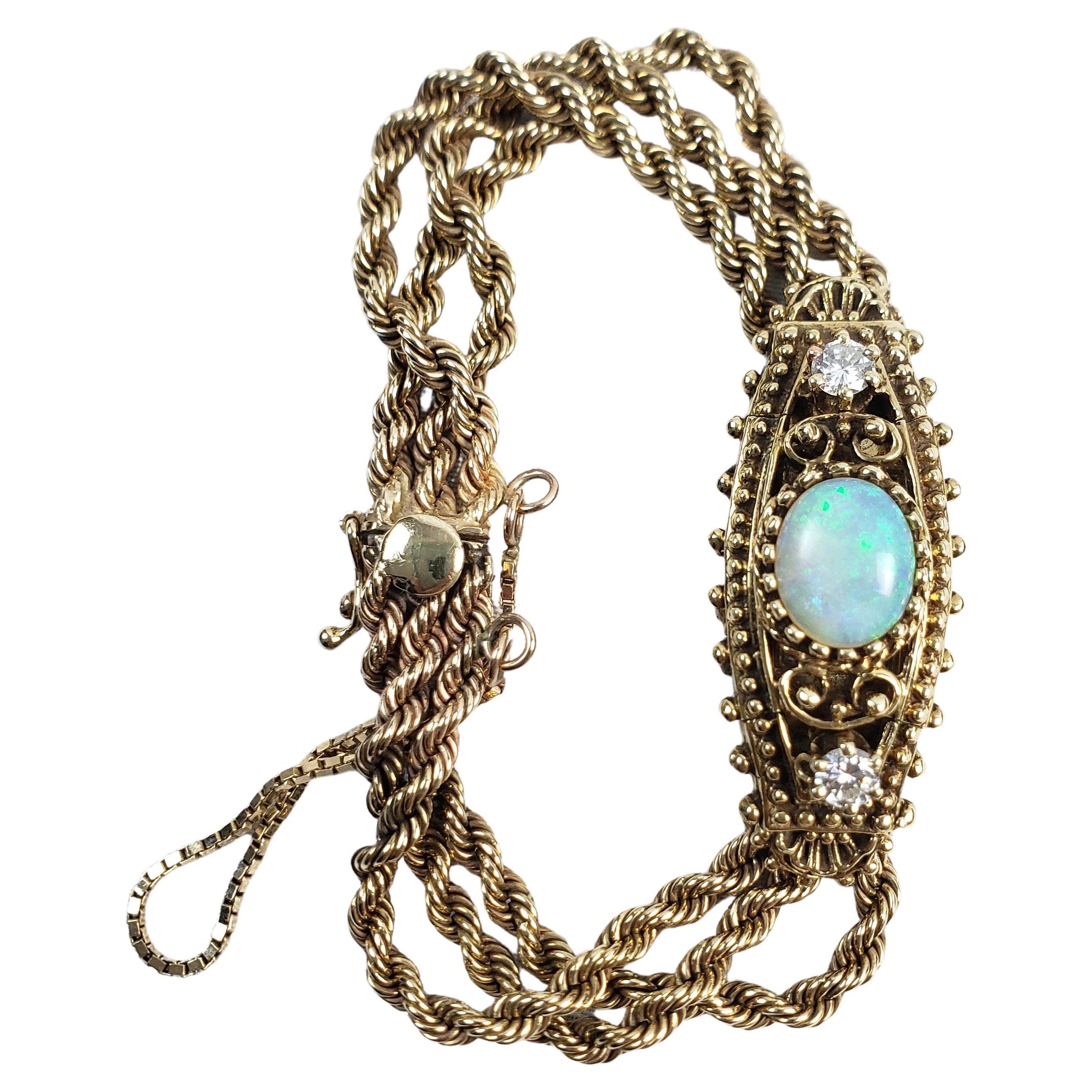 Antike 14 Karat Gelbgold Peek A Boo Damenarmbanduhr mit Opal und Diamanten