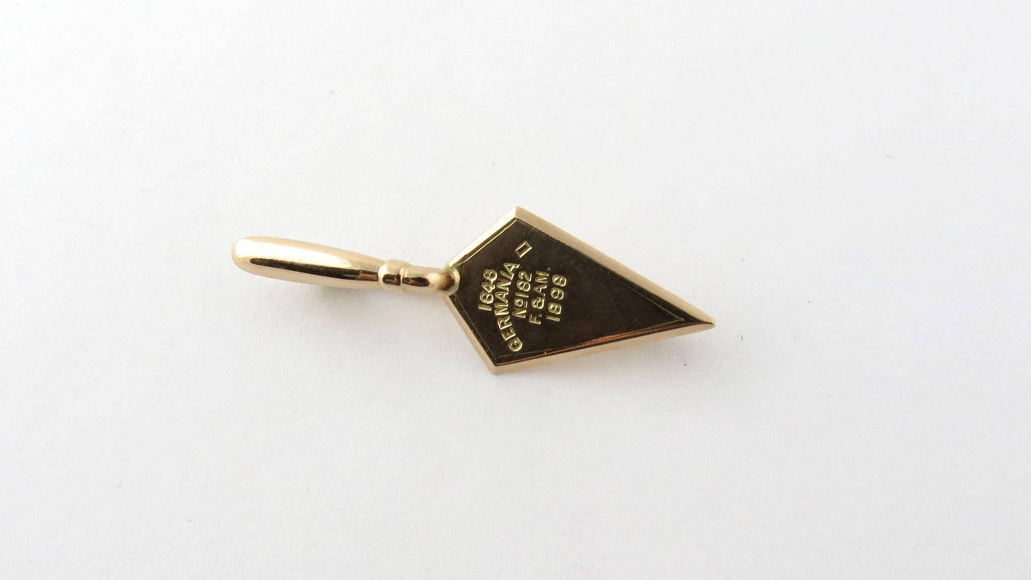 Antique 14K Yellow Gold Trowel Masonic Lapel Pin

This Mason pin was acid tested and stamped 14K. 2.6 g 1.65 dwt 

This trowel is engraved 1848 Germania No. 182 F & AM 1898 

The pin is 36 mm x 12 mm 

This historic pin will be shipped priority mail