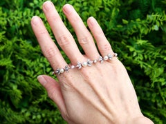 Antique 1.42 Carat Diamond and Natural Pearl Yellow Gold Bracelet, circa 1910