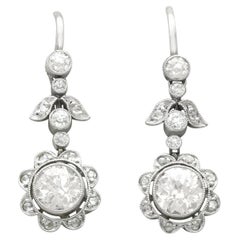 Antique 1.42 Carat Diamond and Platinum Floral Drop Earrings