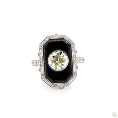 Bague ancienne en or avec un diamant rond taille brillant de 1,42 carat et de l'onyx