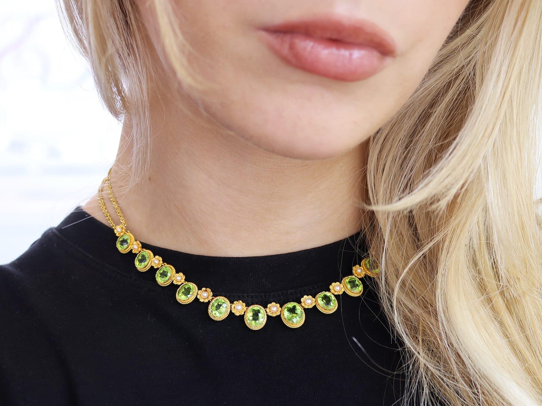 Oval Cut Antique 14.50 Carat Peridot and Pearl, 18k Yellow Gold Necklace Circa 1900 For Sale