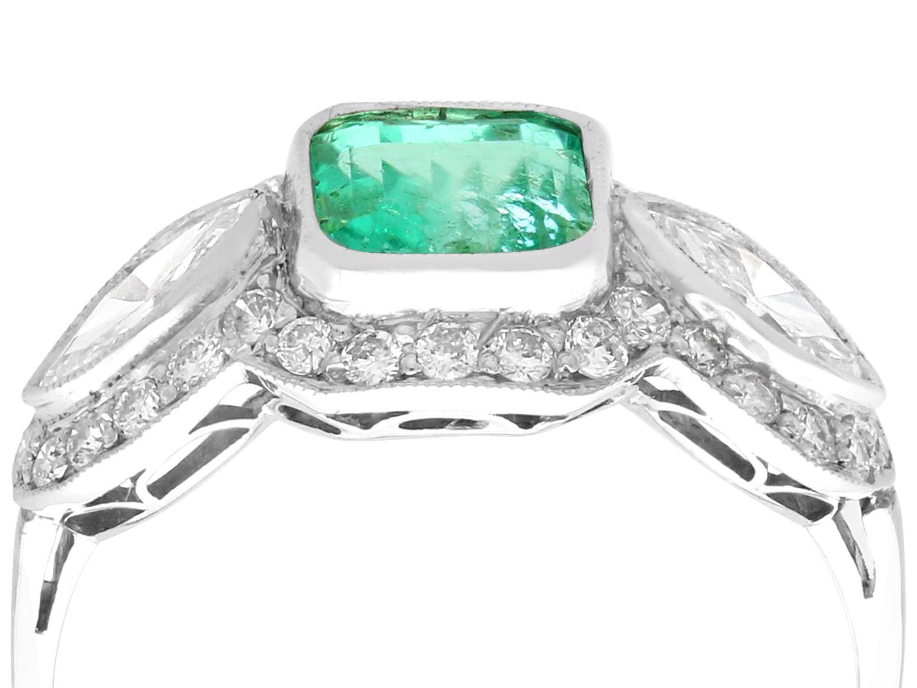 A stunning, fine and impressive antique 1.45 carat emerald and 1.43 carat diamond, platinum dress ring; part of our diverse antique jewelry collections

This stunning, fine and impressive antique emerald and diamond ring has been crafted in