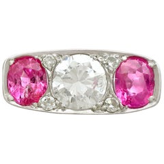 Antique 1.47 Carat Diamond and 2.20 Carat Pink Sapphire Platinum Trilogy Ring