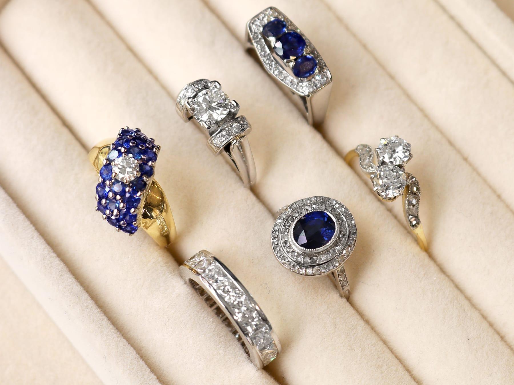 Oval Cut Antique 1.47Ct Sapphire and 0.54Ct Diamond, Platinum Cluster Ring Circa 1910 For Sale