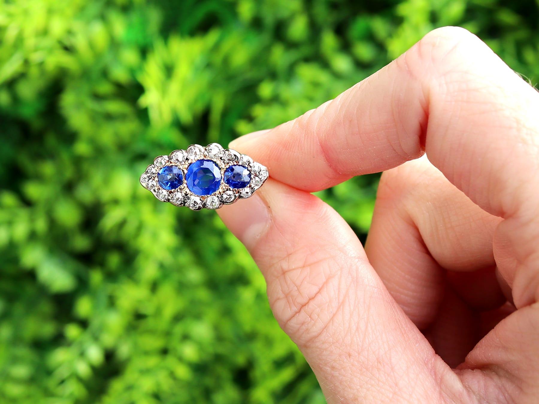 A fine and impressive antique 1.48 carat natural blue sapphire and 1.04 carat diamond, 18 karat yellow gold, 18k white gold set cocktail ring; part of our sapphire and diamond ring collection.

This fine and impressive antique sapphire ring has been