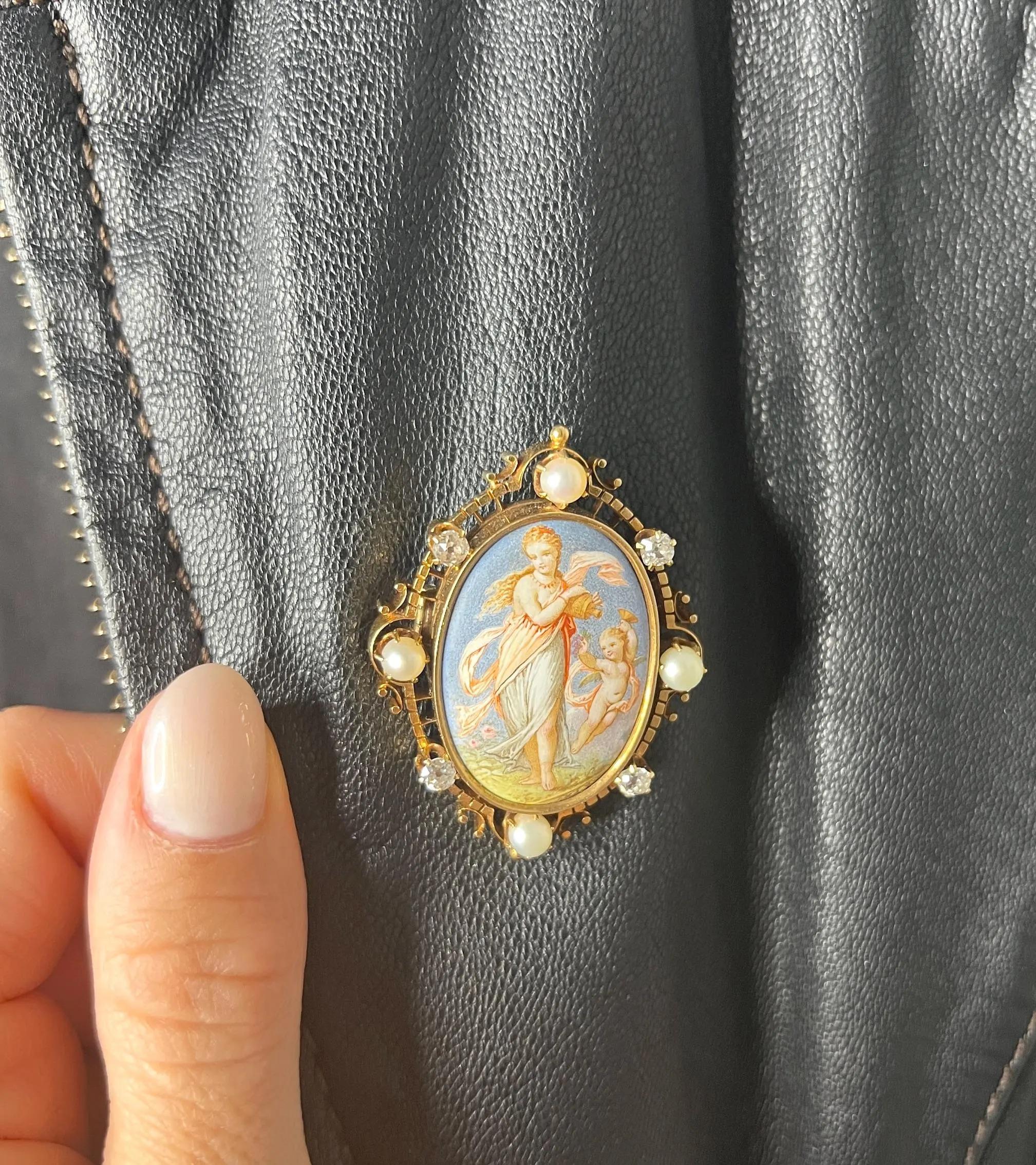 Antique Venus & Cupid Brooch

14ct Gold Stamped 

Circa 1860s

Introducing an exquisite early Victorian 14ct gold stamped cherub portrait brooch, featuring a beautifully hand-painted enamel portrait depicting Venus & Cupid in a happy, vibrant