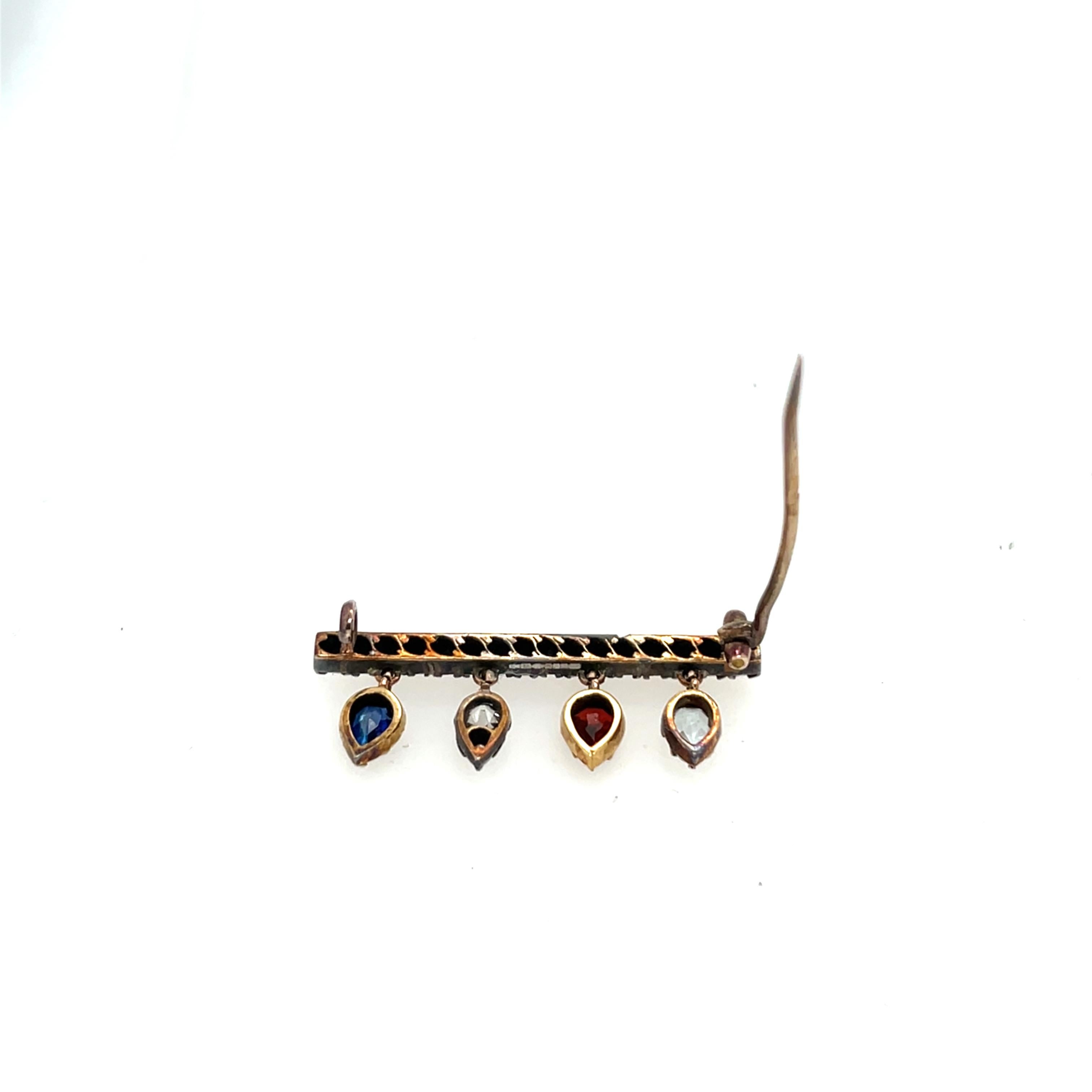 Broche ancienne en or et argent 14ct, sertie de saphir, grenat, aigue-marine et diamant Excellent état - En vente à London, GB