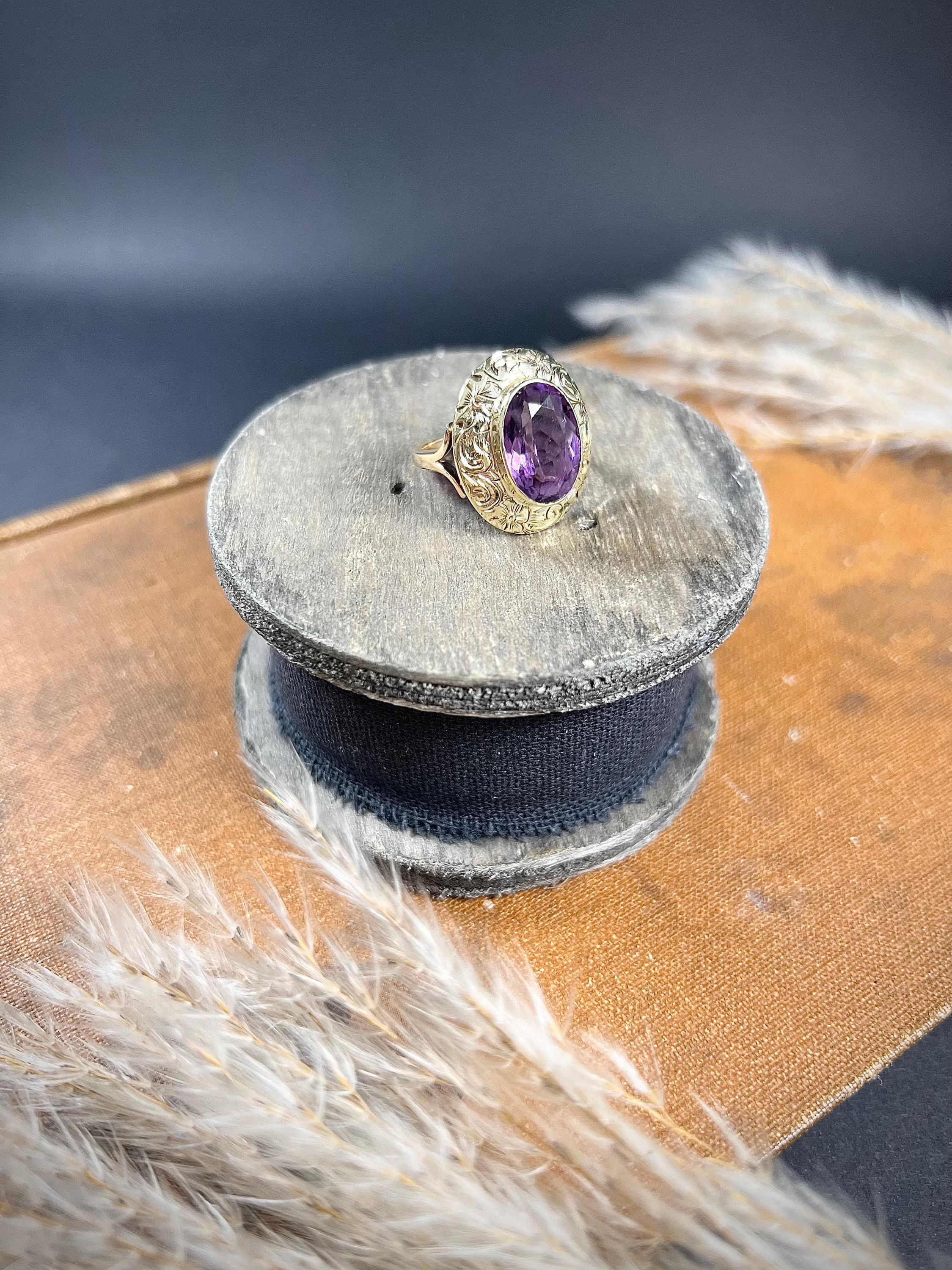 Antique Amethyst Ring

14ct Yellow & Rose Gold Tested 

Circa 1880

A fabulous, Victorian dress ring. Features a lovely, large, faceted, oval amethyst stone. The setting is yellow gold with gorgeous hand carved, floral detailing. Mounted on a 1.6mm