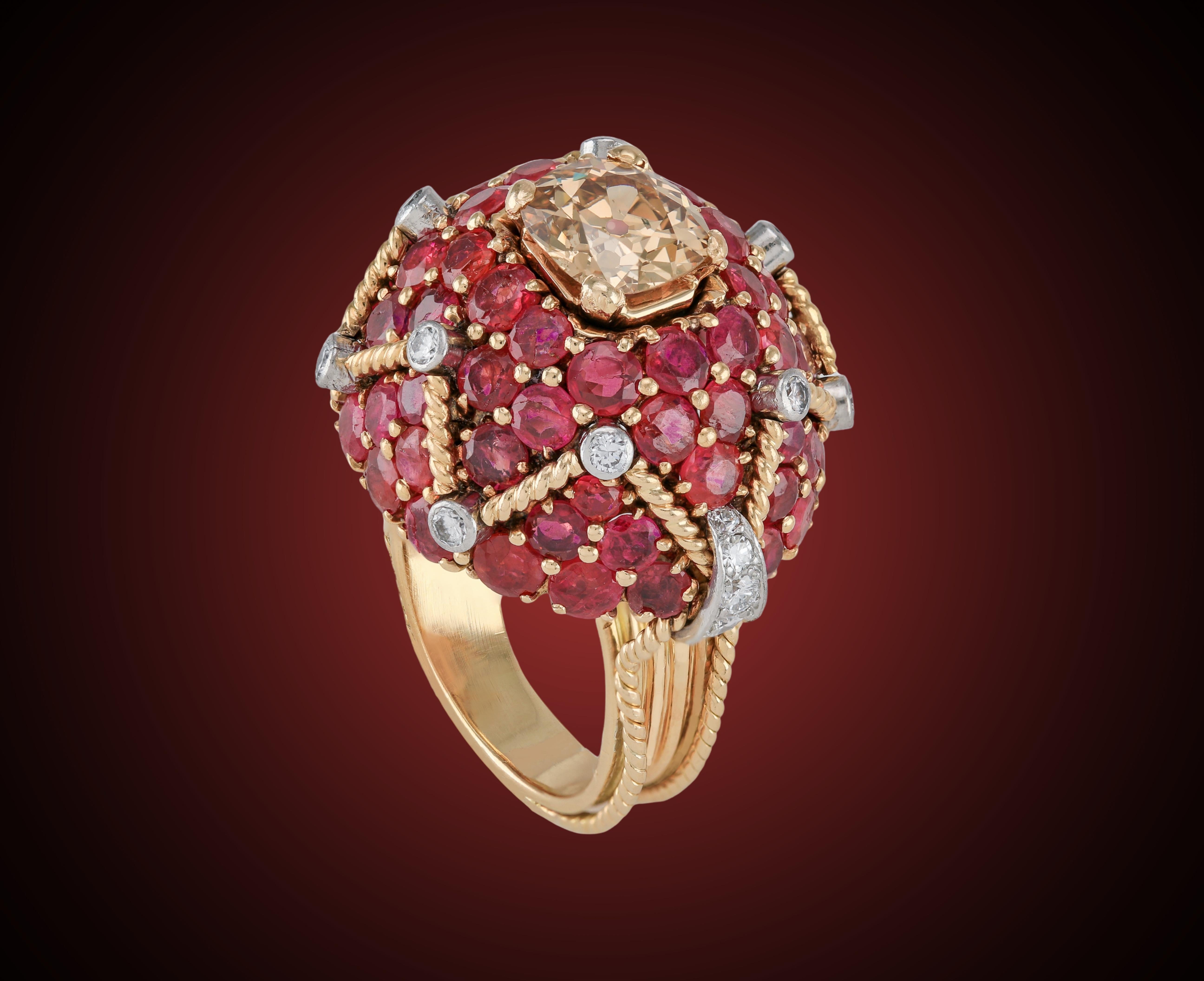 Antique 14k, Center 1.91 ct Fancy-Yellow Brown Diamond Burmese Ruby Bombé Ring
A phenomenal antique creation, this fantastic ring is definitely one of a kind. Whether it will be your engagement ring or your cocktail ring, it will sure make a