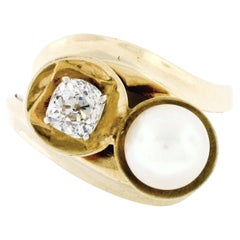 Bague cocktail bypass en or 14 carats avec perle ancienne de 0,58 carat et diamant coussin taille vieille mine