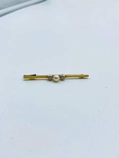 Antique 14k gold bar brooch with diamonds and pearl