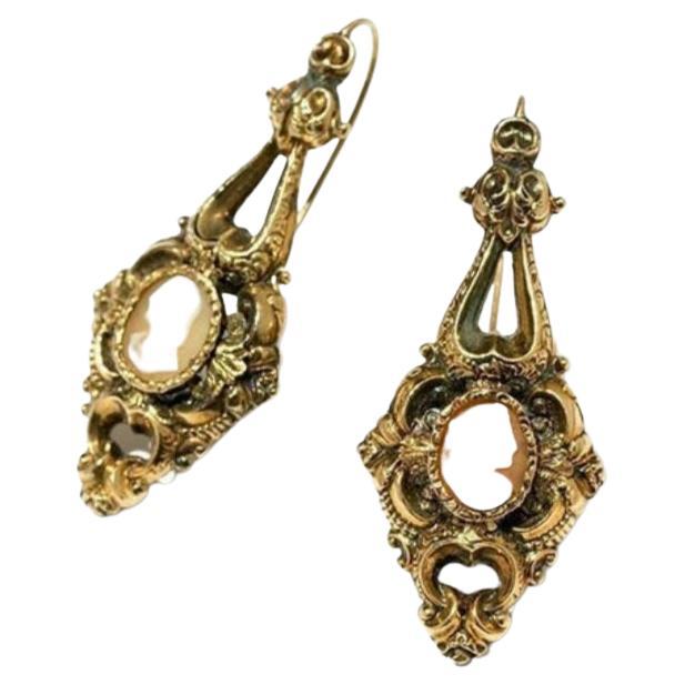 Antique 14k yellow gold earrings in baroque style centered with portrait shell cameo of a man and woman in detailed engraved work on earrings workmanship earrings was made in germany 1850.c 