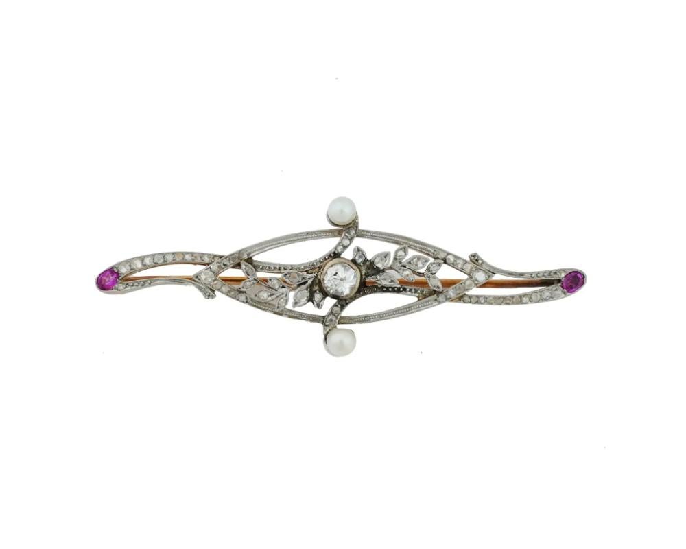An antique 14K Gold Edwardian manner brooch. The brooch is made in a foliage design, encrusted with Diamonds, decorated with Pearls and Amethyst accents in the corners. Unmarked. Circa: early 20th century. Antique and Vintage European Ladies Jewelry