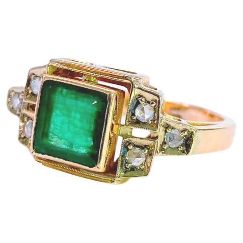 Antique 14k gold ring centered with 1 natural green emerald in emerald cut stone flanked with small rose cut diamonds hall marked 56 russian gold standard and assay mark and initial maker mark 
