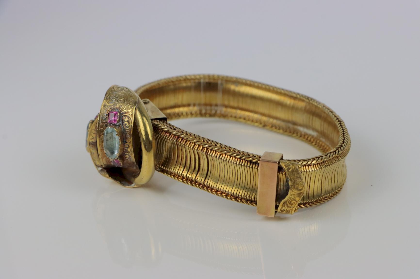 Antique 14K Gold Mesh Belt Bracelet Aquarmarine 
Solid 14K Gold Mesh Belt Bracelet, the center mounted with (2) oval Aquamarines and (4) pink brilliants.

Approximate Dimensions:
22 cm (Maximum Circumference) x 1.5 cm (Strape Width) x 9.56 mm x 4.52