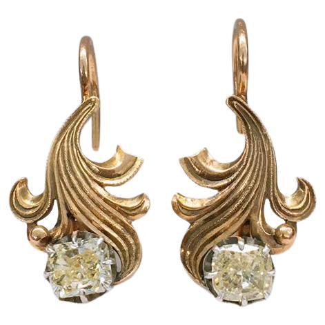 Antique 14k earrings in art novo style with 2 cushion  cut diamond i colour yellow vs clearity diameter 4.56mm estimate total weight 1 carat earrings and earrings lenght 2.5cm was made between 19015/1917.c imperial russian era hall marked 56
