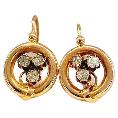 Antique 14k gold earrings in circular designe with 6 old mine cut diamonds estimate weight of 0.50 ct earrings was made during the imperial russian era 19017.c hall marked 56 imperial russian gold standard and assay mark 