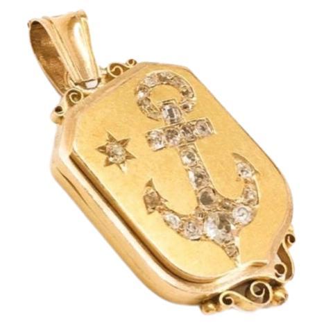 Antique russian 14k gold locket pendant in anchour old cut diamond designe on front with estimate weight of 2 carats and total gold weight 22 grams and 5cm lenght pendant is hall marked 56 gold standard for 14k gold finest