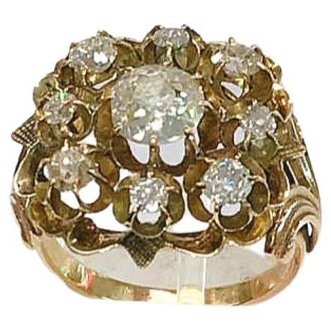 Antique 14k gold large old mine cut diamond ring in open work style with an estimate diamond weight of 1.70 carats in open work style prongs and detailed work on ring setting