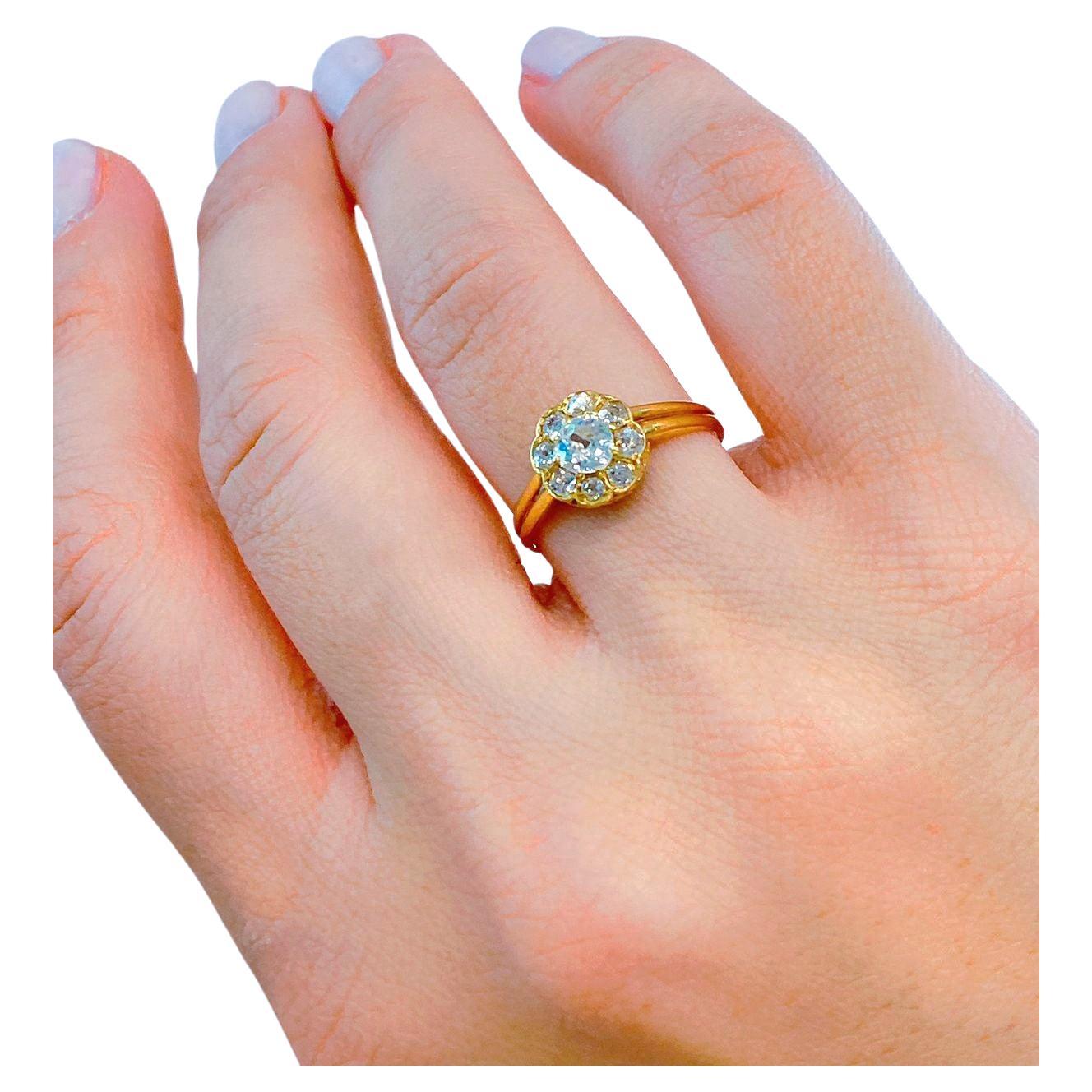 Antique 14k yellow gold ring in solitaire style centered with 1 old mine cut diamond diameter 4.25mm estimate 0.30 ct and ring head diameter 7mm flanked with smaller old mine cut diamonds dates back to europe 1910.c
