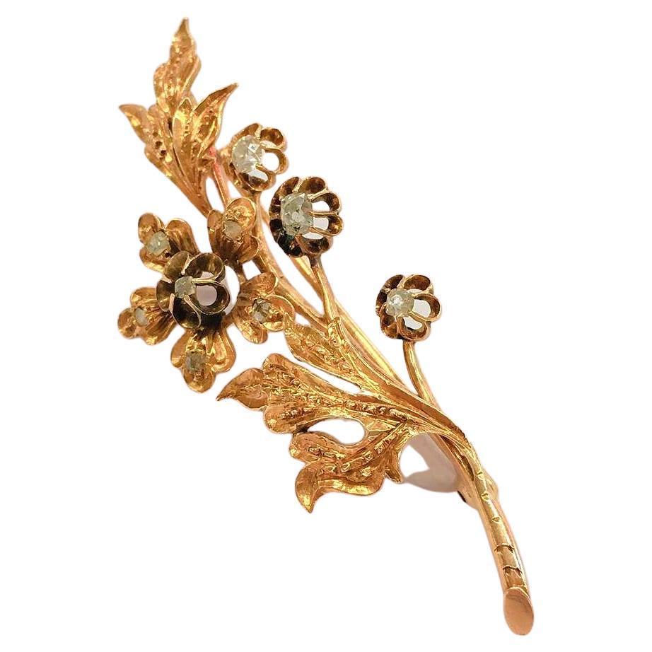 Amtique 14k gold russian brooch in tremblant designe decorted with old mine cut diamonds estimate weight of 1 carat brooch lenght 6.5cm made during the imperial russian 1880/1890.c hall marked 56 imperial russian gold standard and assay marks and