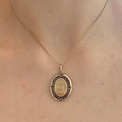 Antique 14K Gold Oval Locket with Niello and Guilloché Decoration, 19th Century