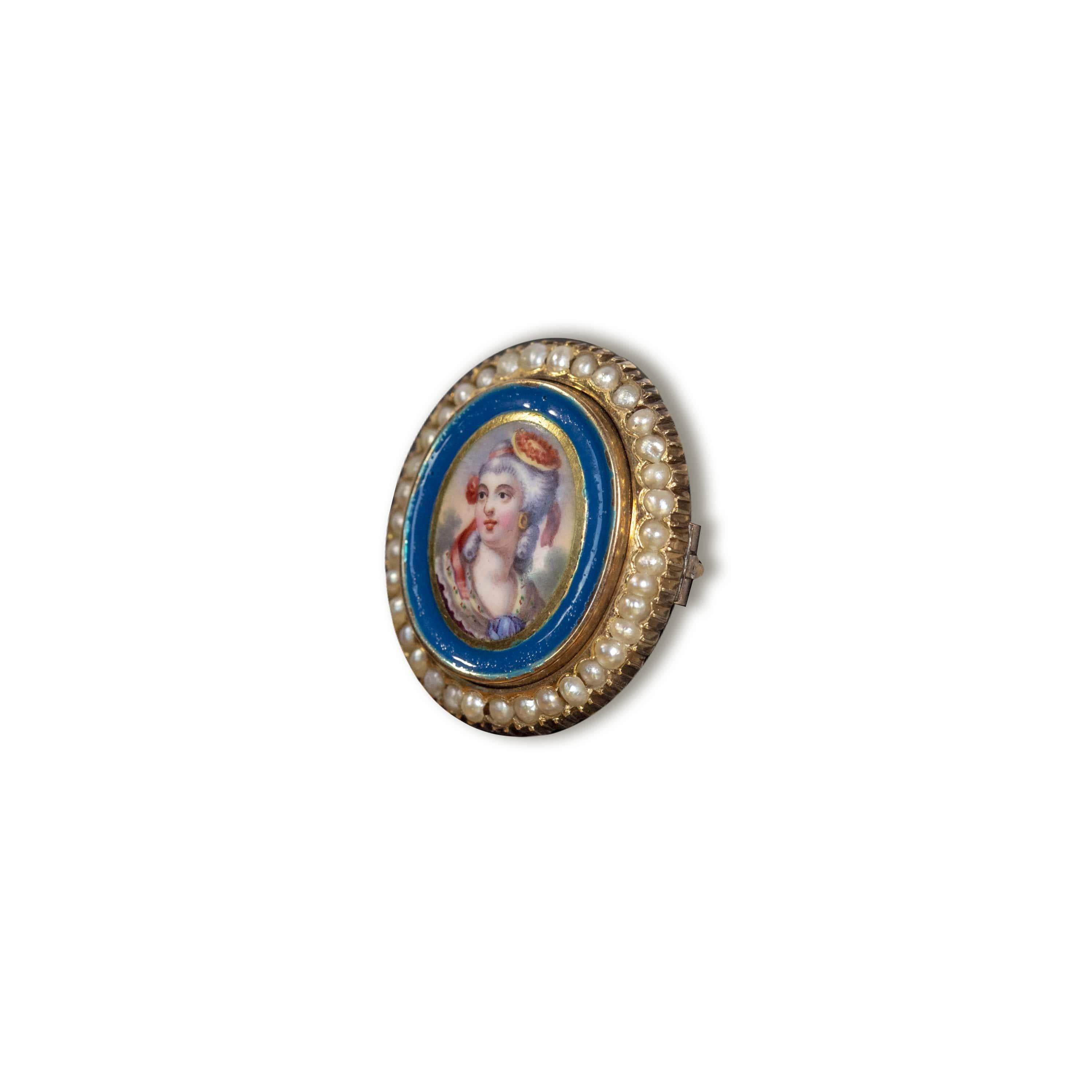 Antique 14k gold portrait brooch hand painted Swiss enamel porcelain with natural seed pearls. It's featuring the miniature portrait of a lady from the court of king XVI of France. It is framed with inset pearls. It measures approximately 3/4 by 1