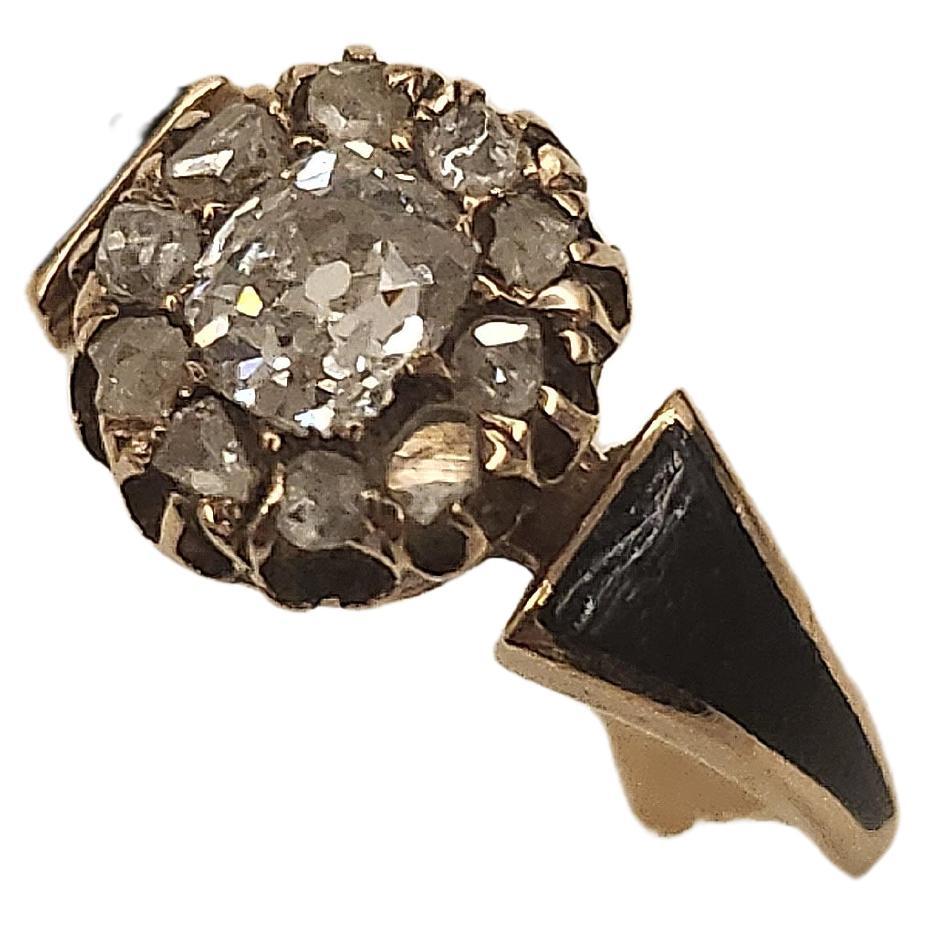 Antique 14k gold ring centered with rose cut diamond dameter 3.7mm flanked with smaller rose cut diamonds ring head diameter 8.18mm with black enamel on ring sides ring was made in russia during the tsarist russian era 1890.c