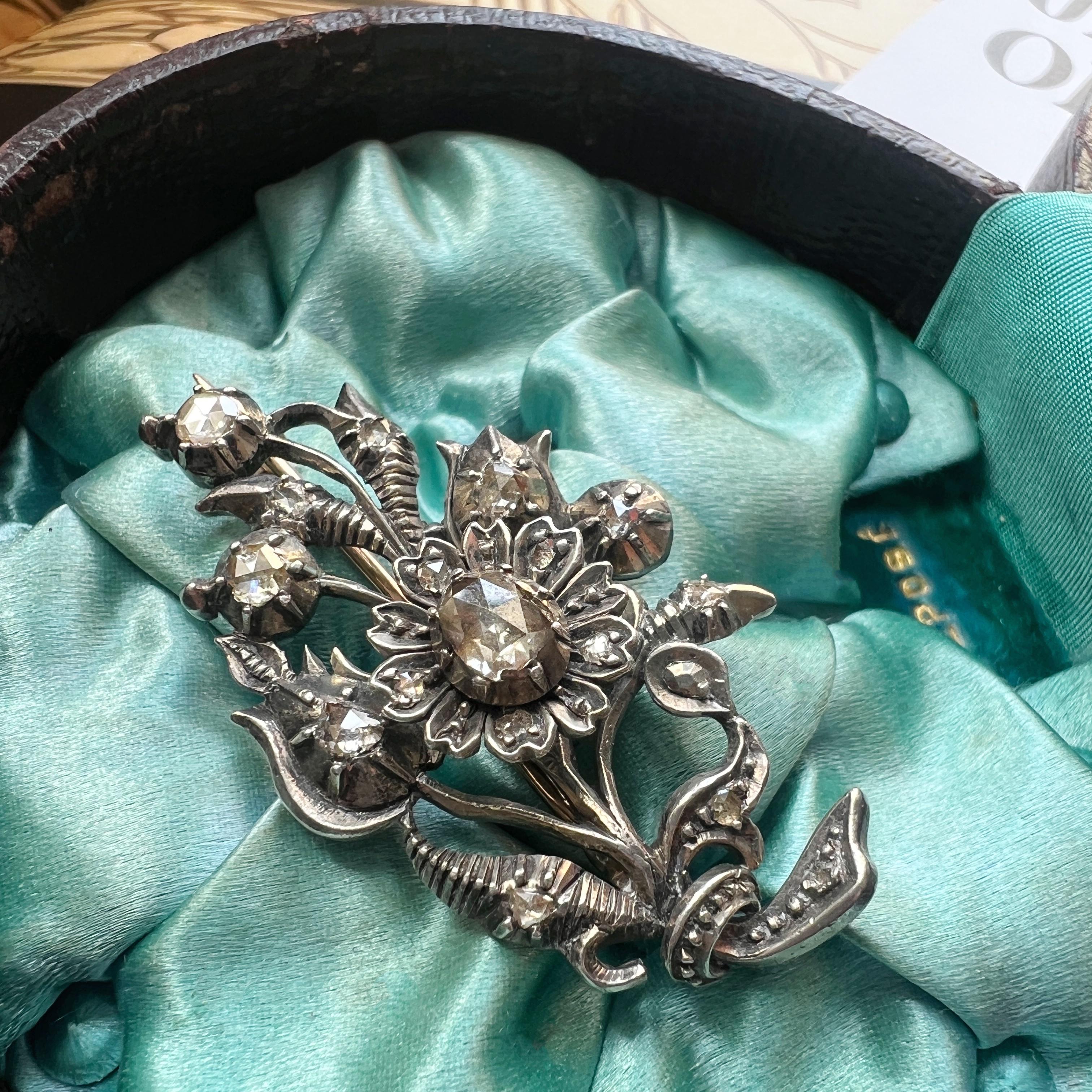 For sale a lovely rose cut diamond bouquet flower brooch, dated back to the late 18th century / the beginning of the 19th century.

Each flower in the brooch is adorned with a rose-cut diamond, with the largest measuring approximately 7mm in