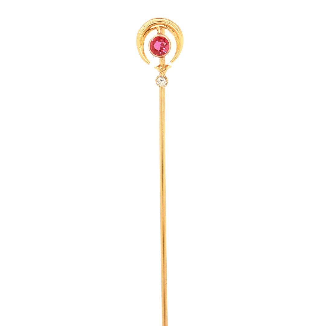 A fine antique stick pin.

In 14 karat gold.

Bezel set with a synthetic ruby and a smaller round cut white sapphire.

Simply a wonderful stickpin!

Date:
20th Century

Overall Condition:
It is in overall good, as-pictured, used estate condition