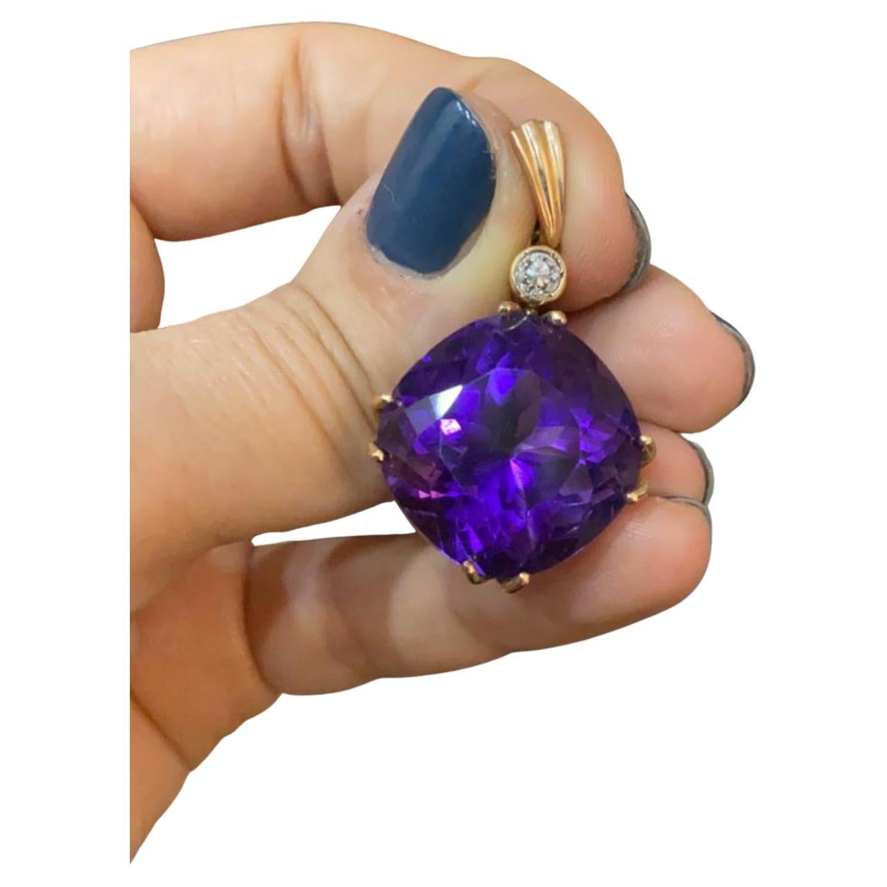 Antique 14k gold russian large purple colour amethyst with a diameter of 19.85mm×19.85mm in open work style 14k gold setting toped with 1 old mine cut diamond hall marked 56 imperial russian gold standard and initial maker mark
