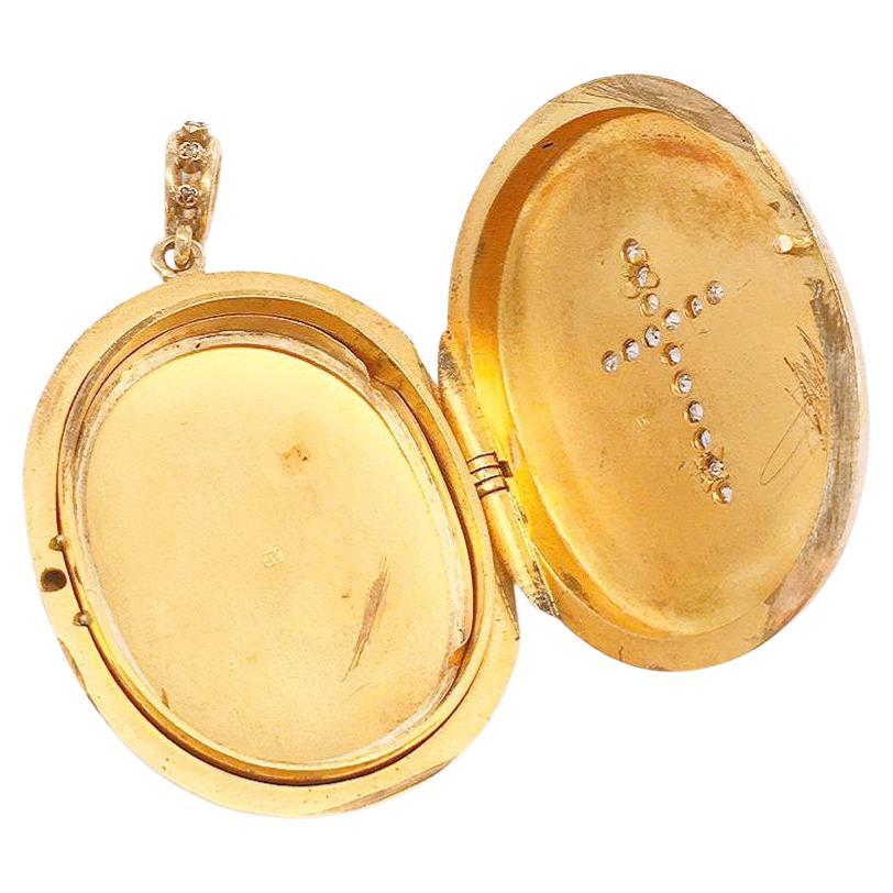 Antique russian locket pendant centered with rose cut diamond cross in 14k gold setting with total weight of 22.44 grams and total lenght of 5cm from bail locket was made in moscow 1850/1899.c imperial russian era hall marked 56 imperial russian