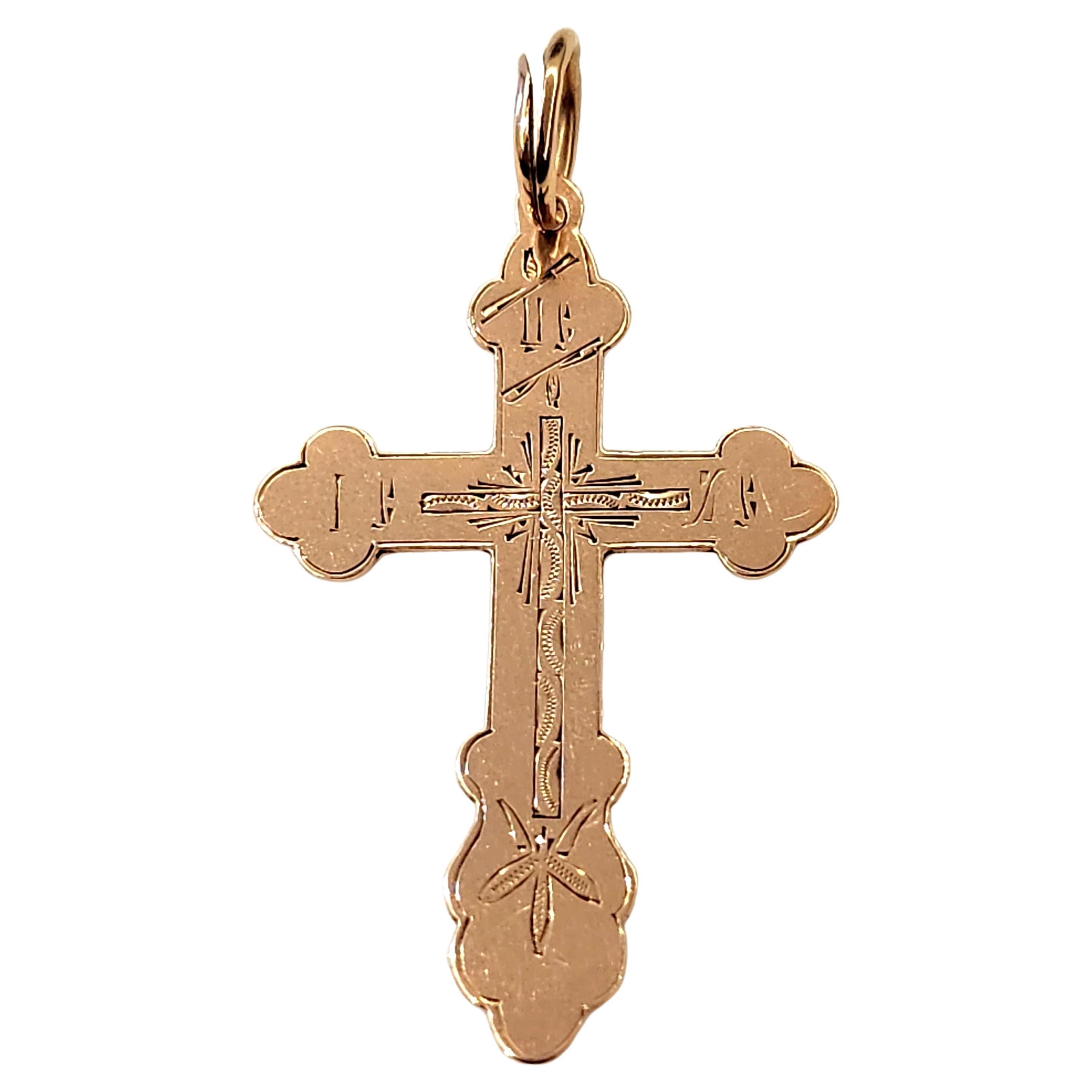 Antique large russian 14k gold cross pendant with engraved detailed work on front written on the back spaci sokrani or save and protect cross was made in moscow during the imperial russian era 1907.c hall marked 56 imperial russian gold standard and