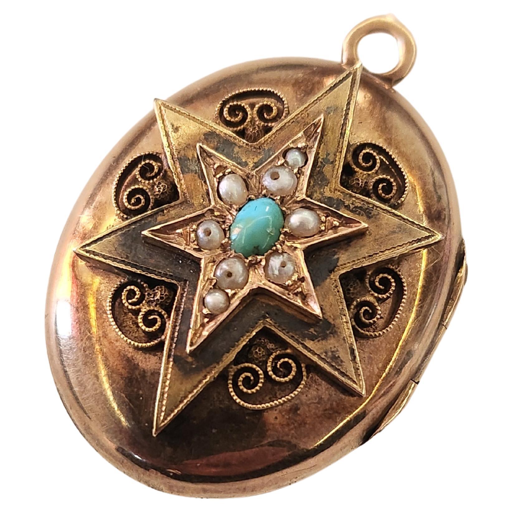 Antique large russian locket pendant in 14k gold centered with a star design decorted with natural sead pearls and natural light blue terquoise stone pendant was made during the imperial russian era 1833.c with total gold weight of 17 grams and 4cm