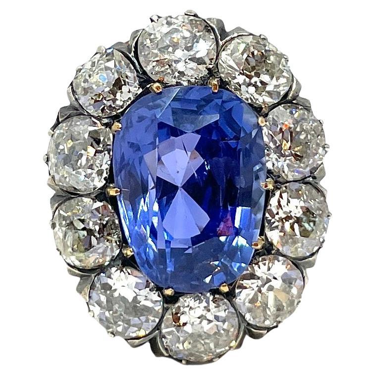 Antique 14K Gold & Silver No Heat Ceylon Sapphire & Diamond Ring Circa 1870-1890.

Ceylon sapphire 11.57 carats
Old mine cut diamonds approximately 8 ct tw

Accompanied by AGL report #1137784 stating origin and no heat or clarity enchacement.